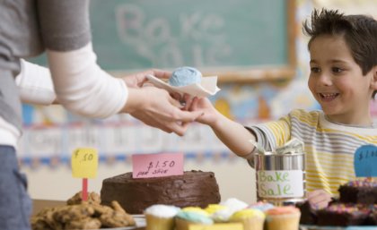 Some public schools raise up to $1 million a year – and not just via cake stalls. Getty image.